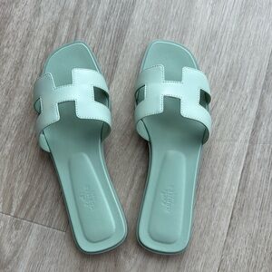 HERMES Sea Green Orans Calfskin